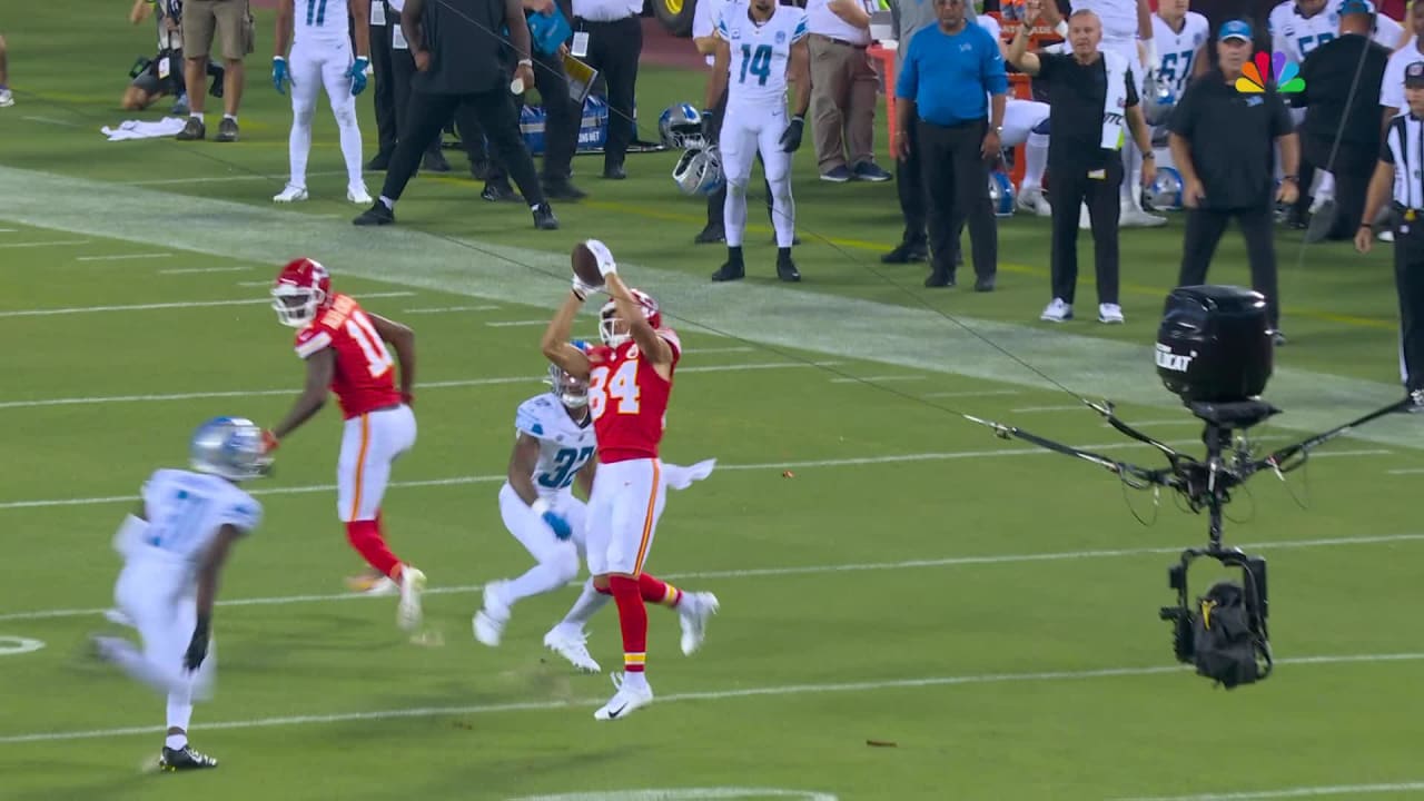 Kansas City Chiefs wide receiver Justin Watson high-points a 19-yard pass  from Chiefs quarterback Patrick Mahomes on third down