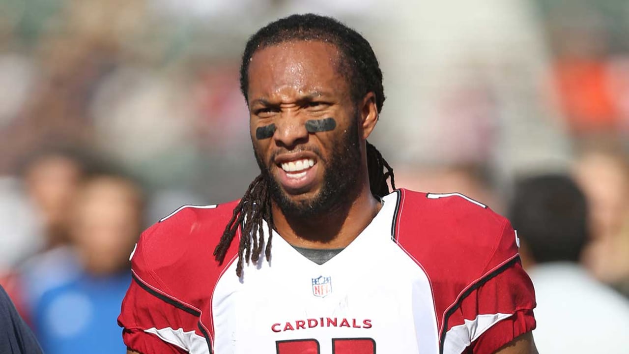 Arizona Cardinals' Larry Fitzgerald aided by Hines Ward