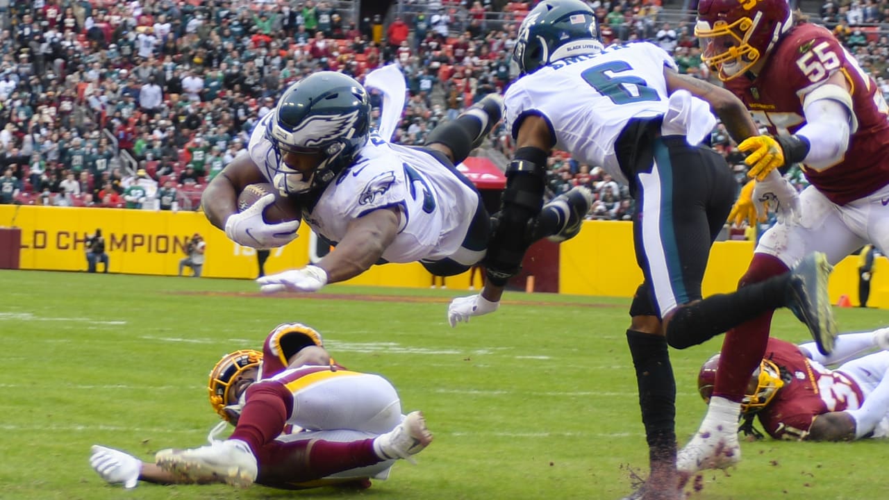 Philadelphia Eagles running back Boston Scott hammers into end zone on