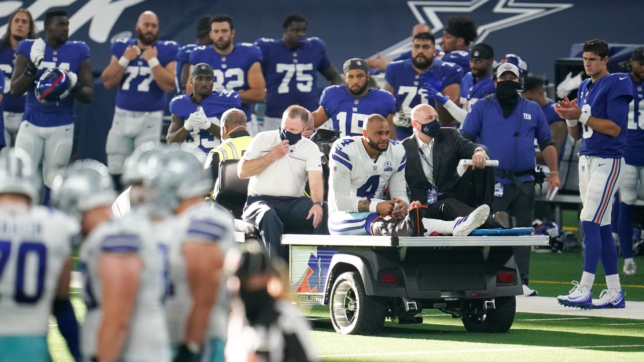 Top photos from Cowboys-Giants: Teary-eyed Dak Prescott carted off, players  support their star QB after gruesome injury