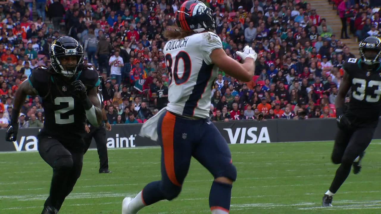 Denver Broncos quarterback Russell Wilson dimes tight end Greg Dulcich