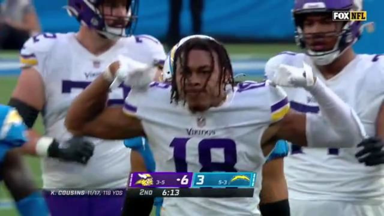 Minnesota Vikings wide receiver Justin Jefferson flexes on Bolts after snatching quarterback