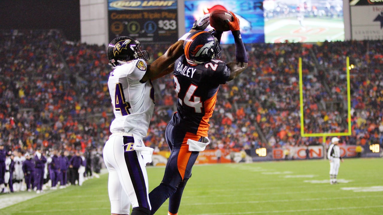 Denver Broncos wide receiver Demaryius Thomas (88) makes a catch in front  of Baltimore Ravens cornerback Lardarius Webb (21) during the first half of  an NFL football game in Baltimore, Sunday, Oct.