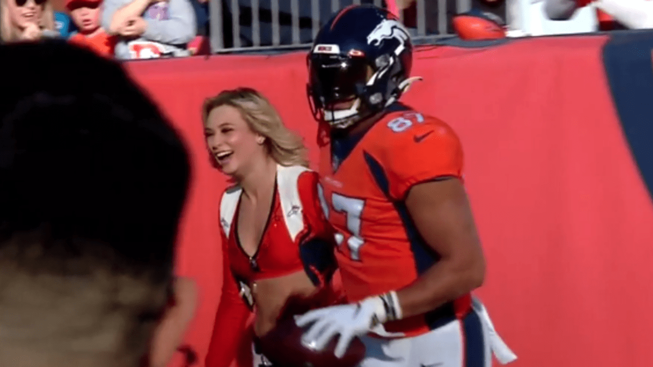 Denver Broncos tight end Noah Fant celebrates with Broncos cheerleader  after beautiful 32-yard gain