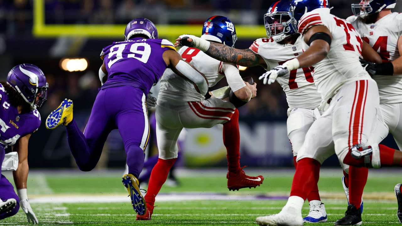 Seattle Seahawks linebacker Bobby Wagner loops around the edge for a sack  of New York Giants quarterback Daniel Jones