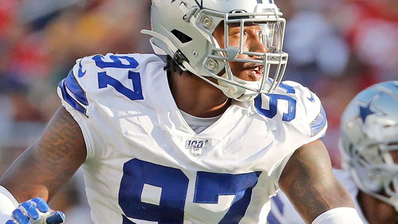 Dallas Cowboys defensive end Taco Charlton (97) walks off the