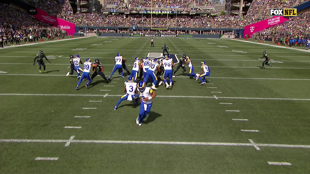 Los Angeles Rams running back Cam Akers fights through contact for a  12-yard gain