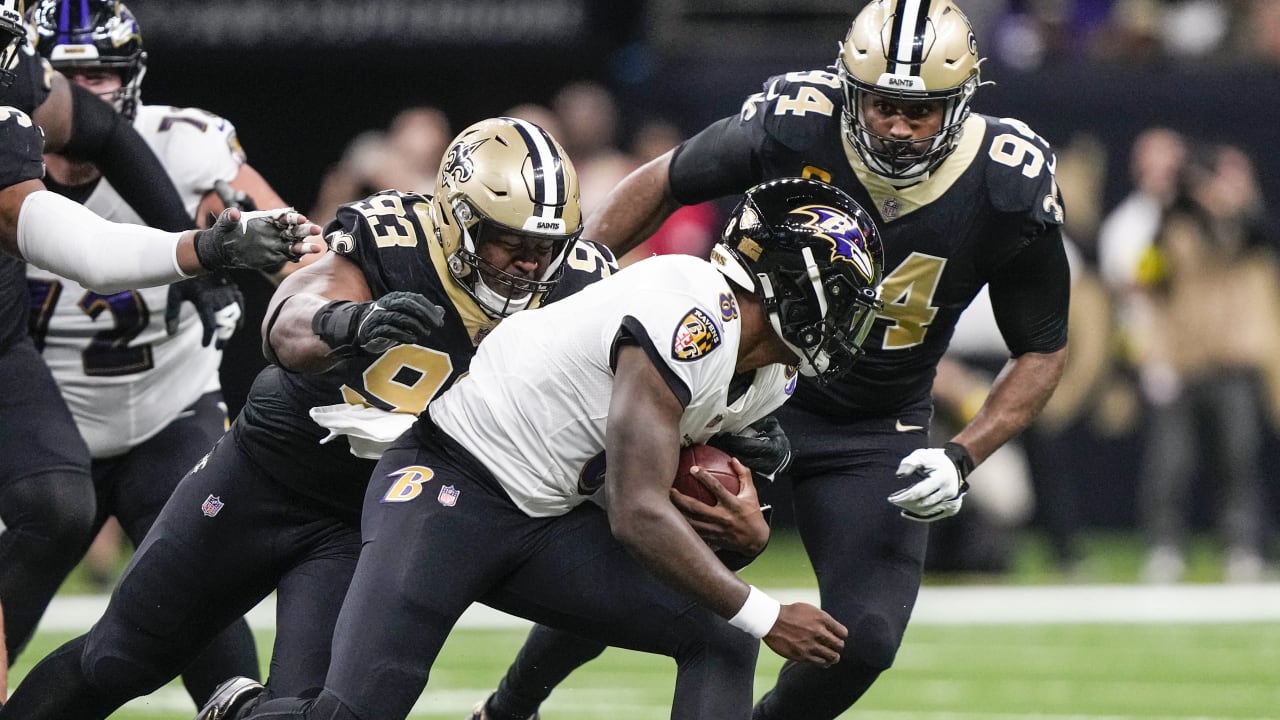 Baltimore Ravens quarterback Lamar Jackson has nowhere to go as he's  swarmed by New Orleans Saints on attempted QB keeper