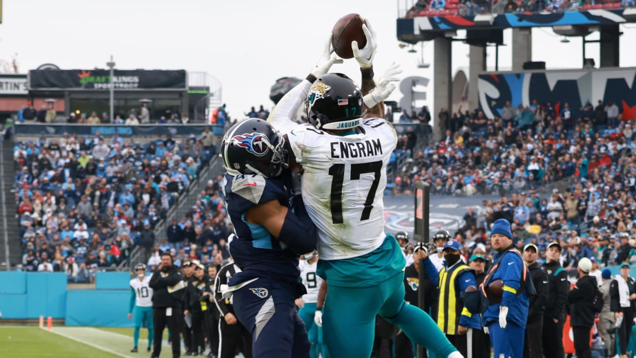 NASHVILLE, TN - DECEMBER 11: Jacksonville Jaguars tight end Evan Engram  (17) scores a touchdown in front of Tennessee Titans safety Andrew Adams  (47) during a game between the Tennessee Titans and