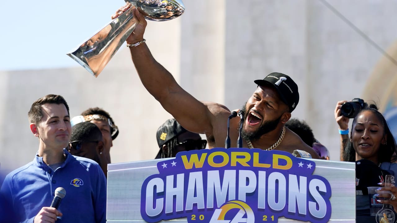 Rams' Aaron Donald not about to let go of Super Bowl trophy