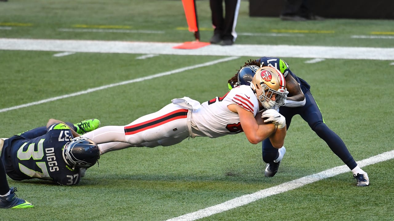 San Francisco 49ers tight end Ross Dwelley (82) runs during a play during  an NFL football game between the Detroit Lions and the San Francisco 49ers  in Detroit, Michigan USA, on Sunday