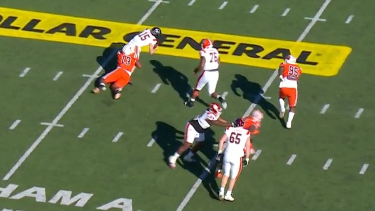 Bowling Green Falcons defensive lineman Karl Brooks chases down TCU Horned Frogs quarterback Max