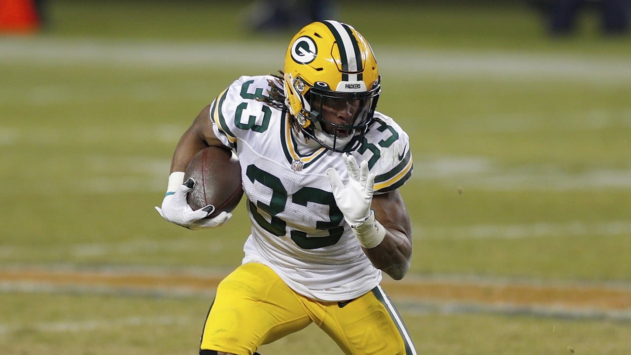 Green Bay Packer Aaron Jones flashes '915' after touchdown over Bills