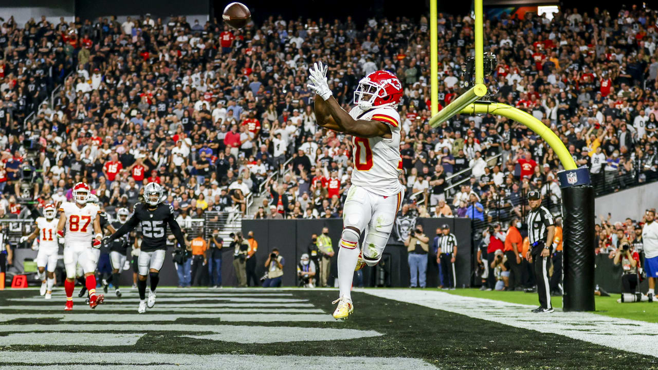 Kansas City Chiefs wide receiver Tyreek Hill (10) dives to try and make a  catch past Raiders de …