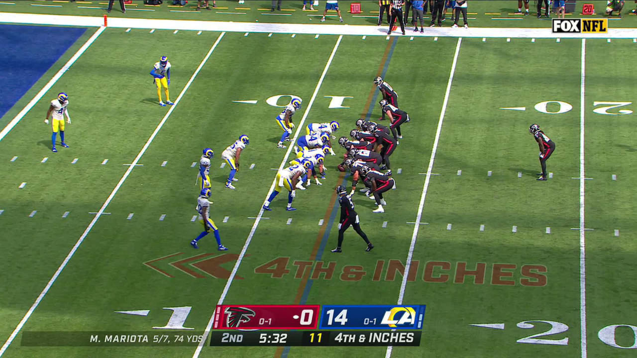 Atlanta Falcons quarterback Marcus Mariota slips, but somehow quickly