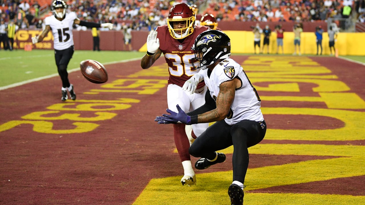 Baltimore Ravens wide receiver Tylan Wallace reels in quarterback Tyler  Huntley's low 10-yard TD dart