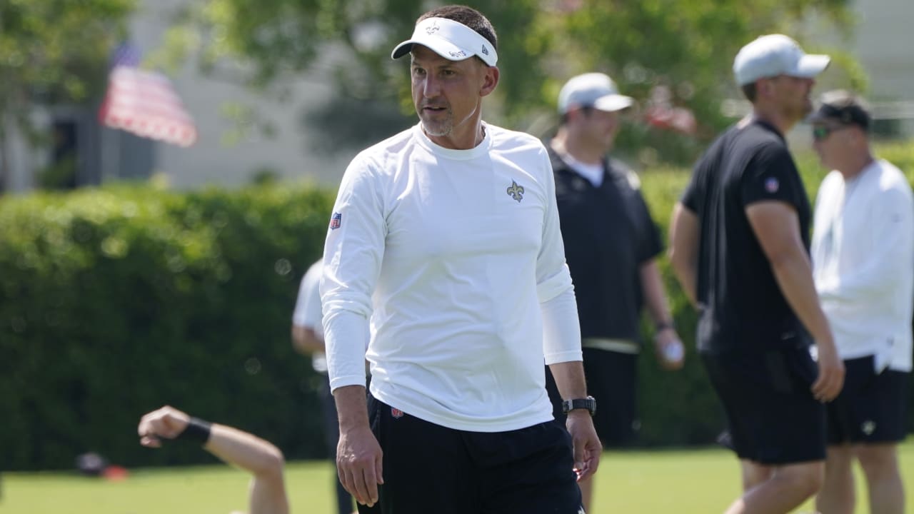 New Orleans, USA. August 13, 2023: New Orleans Saints Head Dennis Allen  encourages his players as they come off the field during NFL pre-season game  action between the New Orleans Saints and