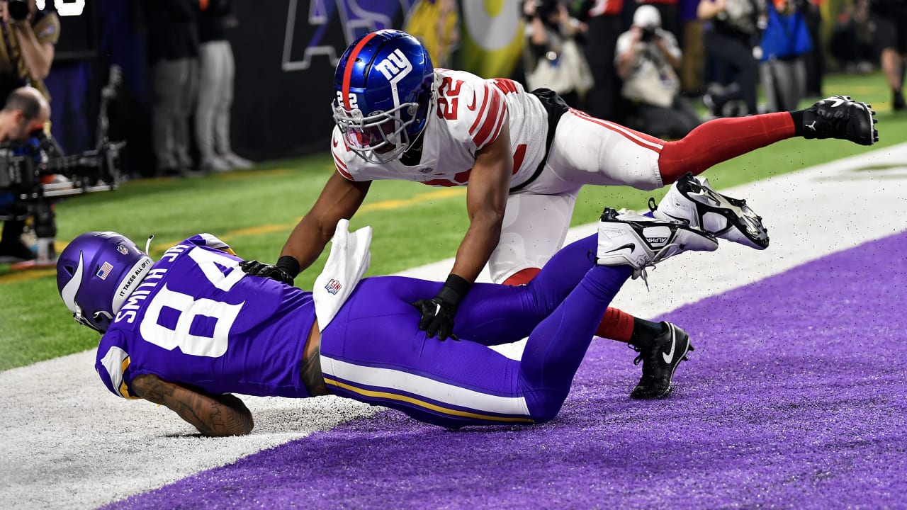 Minnesota Vikings quarterback Kirk Cousins locates tight end Irv Smith Jr.  in back of end zone for TD