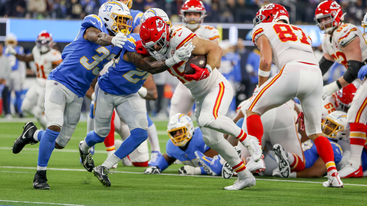 Kansas City Chiefs fullback Michael Burton hops through pile for FB's