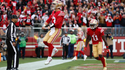 San Francisco 49ers quarterback Brock Purdy lofts 20-yard back-shoulder  dime to wide receiver Brandon Aiyuk