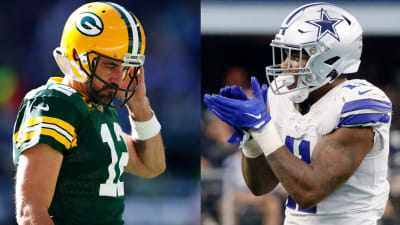 GREEN BAY, WI - NOVEMBER 13: Dallas Cowboys running back Malik Davis (34)  runs during a game between the Green Bay Packers and the Dallas Cowboys at  Lambeau Field on November 13