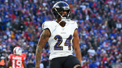 Baltimore Ravens cornerback Marcus Peters (24) looks on during pre-game  warm-ups before an NFL football game against the Carolina Panthers, Sunday,  Nov. 20, 2022, in Baltimore. (AP Photo/Terrance Williams Stock Photo 