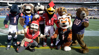 Metropolitan Police officers pose for photos with NFL Mascots during the  Fan event on the Southbank of the River Thames with activities and an NFL  shop on Saturday, Oct. 01 2022 in