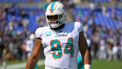 Miami Dolphins defensive tackle Christian Wilkins (94) laughs on the  sidelines during an NFL football game against the Philadelphia Eagles,  Saturday, Aug. 27, 2022, in Miami Gardens, Fla. (AP Photo/Doug Murray Stock