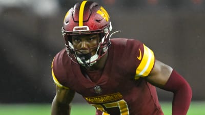 Washington Football Team wide receiver Terry McLaurin (17) spikes the ball  after scoring a touchdown during the second half of an NFL football game  against the Atlanta Falcons, Sunday, Oct. 3, 2021