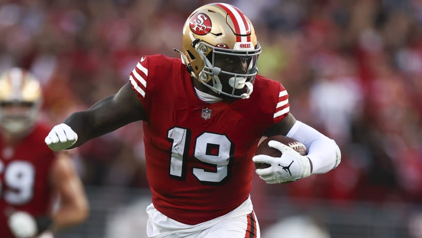 San Francisco 49ers wide receiver Deebo Samuel takes a tunnel screen for a  30-yard gain on third down