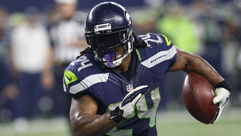 Seattle Seahawks running back Marshawn Lynch (24) walks the sidelines as he  sits out the fourth quarter in the against the New Orleans Saints at  CenturyLink Field in Seattle, Washington on December