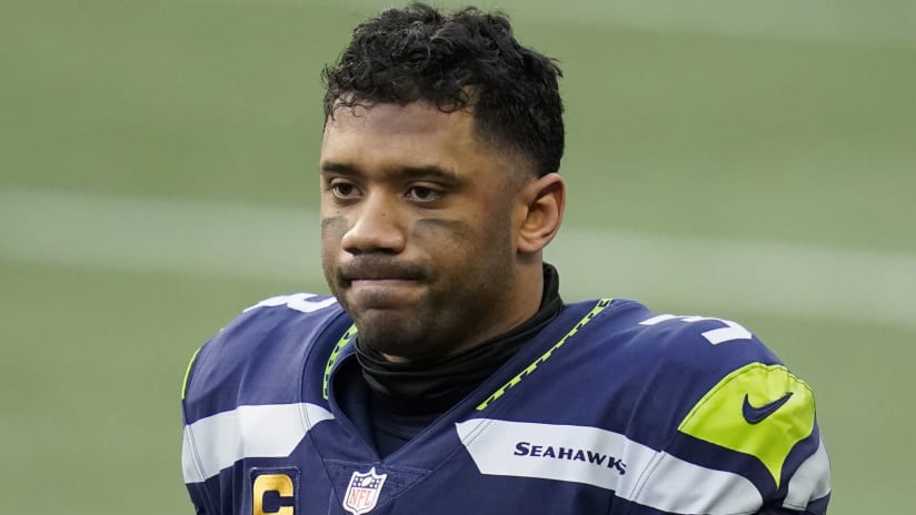 Seattle Seahawks' Carlos Dunlap on Russell Wilson: 'He told me he's with us  and he's here to stay' 