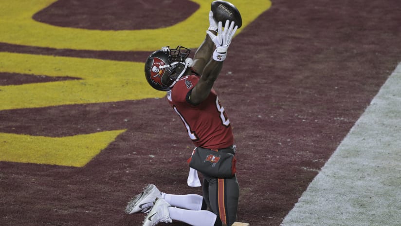 Tom Brady-led Buccaneers beat Washington for franchise's first playoff win  since '03 Super Bowl