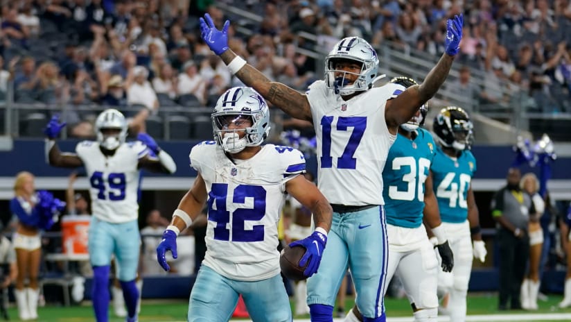 Dallas Cowboys running back Deuce Vaughn (42) celebrates with Dallas Cowboys  wide receiver Dennis Houston (17) after Vaughn scores a touchdown during  the second half of an NFL preseason football game against