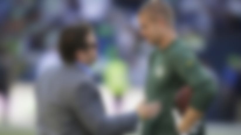 Schneider chats with Packers receiver Jordy Nelson, who was drafted during Schneider's most recent stint in Green Bay, before the 2014 season-opener in Seattle.