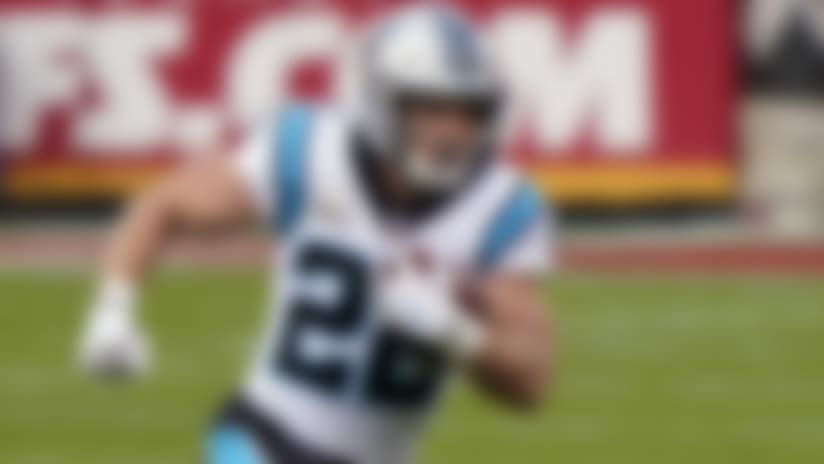 FILE - In this Nov. 8, 2020, file photo, Carolina Panthers running back Christian McCaffrey (22) carries the ball against the Kansas City Chiefs during the first half of an NFL football game in Kansas City, Mo. The Panthers have restructured the contracts of running back Christian McCaffrey and linebacker Shaq Thompson, freeing up more than $11 million in salary-cap space before the start of free agency. (AP Photo/Jeff Roberson, File)