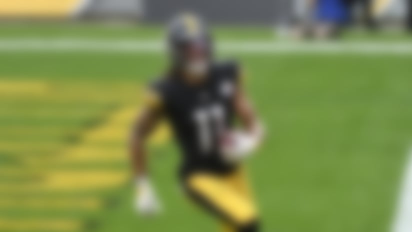 Pittsburgh Steelers wide receiver Chase Claypool (11) scores his forth touchdown of the game on a 35-yard pass play from quarterback Ben Roethlisberger during the second half of an NFL football game in Pittsburgh, Sunday, Oct. 11, 2020. The Steelers won 38-29. (AP Photo/Don Wright)