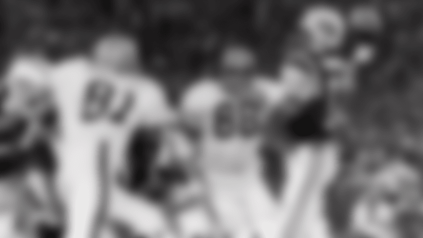 In this Sept. 21, 1970, file photo, Cleveland Browns defensive ends Jack Gregory (81) and Ron Snidow (88) blast through the New York Jets protection to pressure quarterback Joe Namath in the second quarter of their game in Cleveland, Ohio. As part of its celebration of its 100th season, the NFL is designating a Game of the Week, each chosen to highlight a classic matchup. For Week 2, it is the Monday night game between the Browns and Jets. (AP Photo/File)