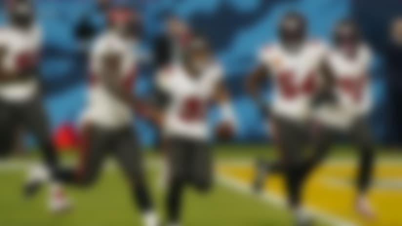 Tampa Bay Buccaneers strong safety Antoine Winfield Jr. (31) celebrates with Devin White (45), Lavonte David (54), Mike Edwards (32) and others after intercepting a pass during the second half of the NFL Super Bowl 55 football game against the Kansas City Chiefs, Sunday, Feb. 7, 2021, in Tampa, Fla. (AP Photo/Lynne Sladky)