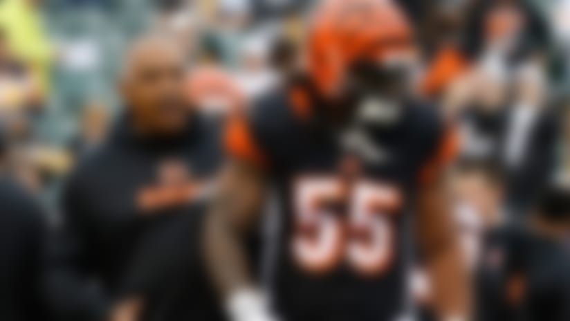 Marvin Lewis (left) says guiding Vontaze Burfict requires both a watchful eye and the patience to let him be himself.