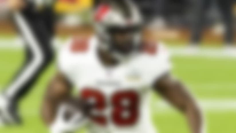 Tampa Bay Buccaneers running back Leonard Fournette (28) runs with the ball during NFL Super Bowl 55 NFL football game against the Kansas City Chiefs on Sunday, Feb. 7, 2021 in Tampa, Fla. The Buccaneers won, 31-9. (Ric Tapia via AP)