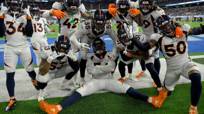 Denver Broncos linebacker Baron Browning (56) runs a play against