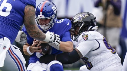 Baltimore Ravens defensive tackle Travis Jones (98) walks off the field  after an NFL football game against the New York Giants Sunday, Oct. 16,  2022, in East Rutherford, N.J. (AP Photo/Adam Hunger