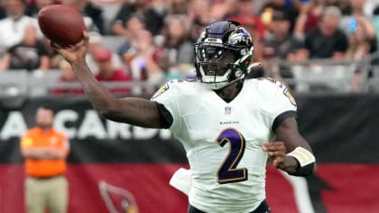 Baltimore Ravens quarterback Anthony Brown threads a 23-yard dime to Ravens  wide receiver Makai Polk between two defenders