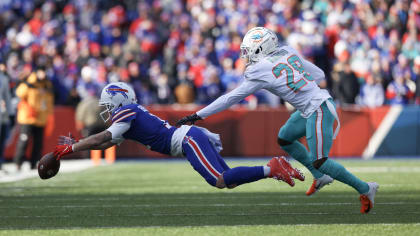 Miami Dolphins cornerback Kader Kohou tackles Chicago Bears wide