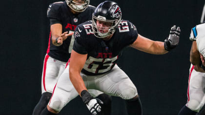 Atlanta Falcons guard Chris Lindstrom (63) and tight ends coach