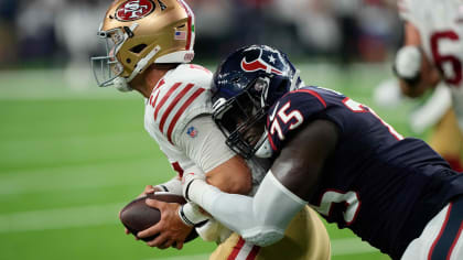 Houston Texans defensive end Adedayo Odeleye (75) gets past San