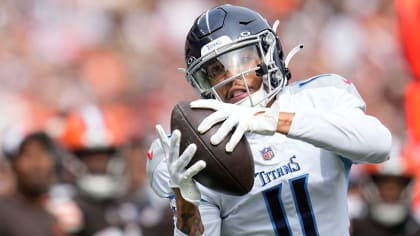 Tennessee Titans quarterback Malik Willis locates wide receiver Chris Moore  on first pass of the day for 30-yard gain