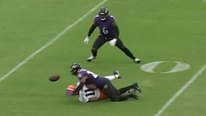 Baltimore Ravens safety Geno Stone leaps to snag Pittsburgh Steelers  quarterback Ben Roethlisberger's deep ball for INT