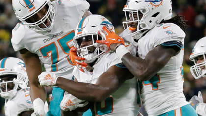 Miami Dolphins' Leonte Carroo (left) and New Orleans Saints